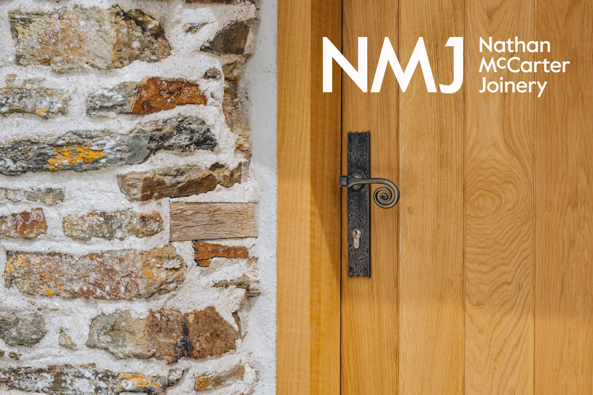 Close up of wooden door with NMJ logo