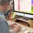 Graeme Piper writing copy at his desk